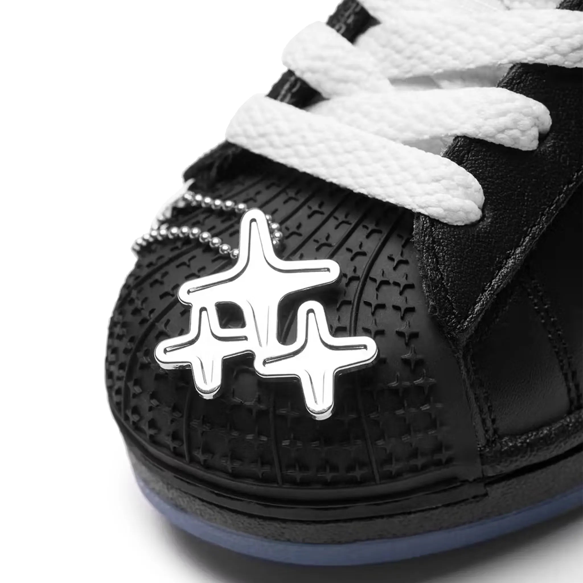 Close up of Drama Call x Adidas Superstar II Black Metrolink Blue